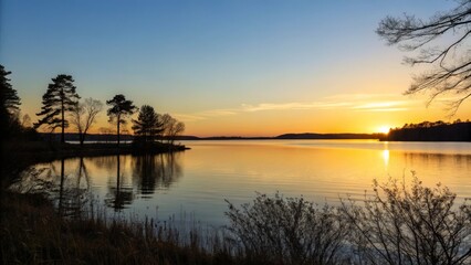 Obraz premium Beautiful sunset over the lake. Landscape with lake and trees.