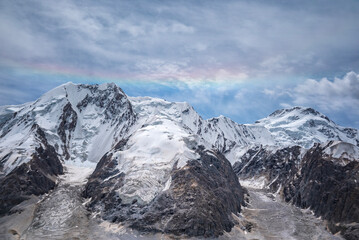 Tien shan mountains with rainbow