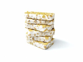 Tempeh or soybeans fermentation isolated on white background. Indonesian traditional foods. Healthy food lifestyle 