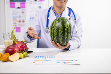 Fototapeta premium Young Asian Nutritionist, Health Doctor, Fruit, Weight Loss