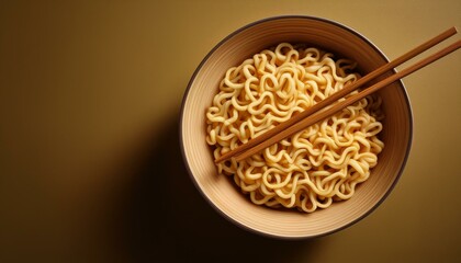 noodles with chopsticks, instant noodles in a bowl with chopsticks on the table, top view photo