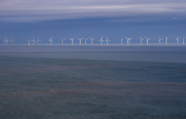 Gwynt y Mor off shore wind farm on horizon © Philip