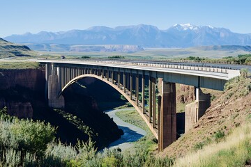 Highway Bridge Spanning River Valley Majestic Mountains