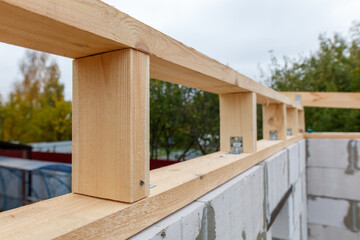 A wooden beam is being used to support a wall