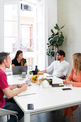 Business people having meeting in modern office discussing new project