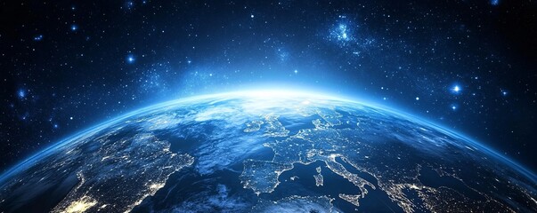 Planet earth rotating in space showing europe at night with city lights visible from orbit