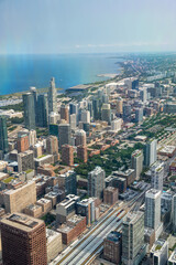 Obraz premium Chicago, IL - July 24, 2024: Aerial view of Chicago skyline. Skyscrapers and city landmarks
