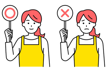 ○×マークのプラカードを上げるエプロン姿の女性