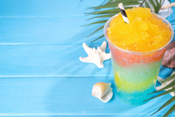 Colorful slushie drink, multicolored frozen juice cocktail