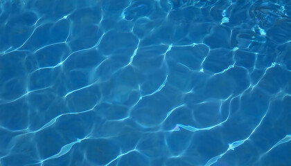 Obraz premium Crystal Clear Blue Water Surface with Sunlight Caustics - Nature Texture