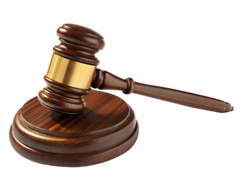 Wooden judge gavel on sound block - Close-up of a wooden judge's gavel with a gold band resting on a sound block, symbolizing law, justice, and authority.