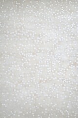 Simple dotted white pattern with small, evenly spaced textures