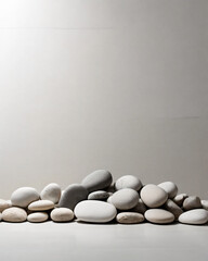 White pebbles neatly arranged on a plain background.