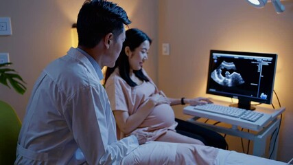 Expectant mother receives ultrasound examination at a medical clinic during prenatal checkup