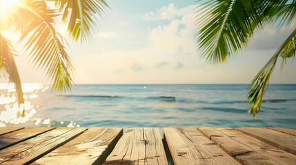 Wooden tabletop overlooking tranquil tropical beach with palm leaves, glistening bokeh sea, and clear summer sky perfect for product display or vacation-themed designs