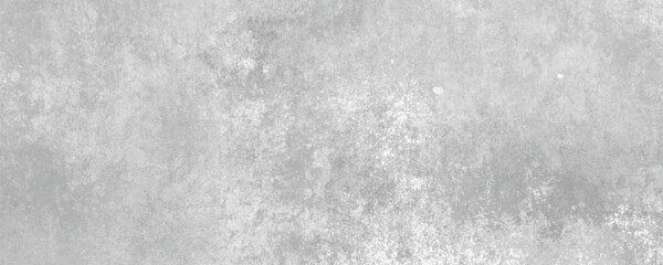 A naturally weathered concrete wall showcasing a vintage industrial look and grey tones
