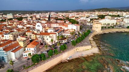 Aerial perspective of Alghero, showcasing the Mediterranean beauty on a warm afternoon