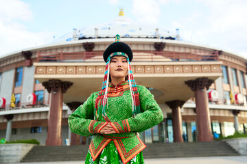 Mongolian girl wearing traditional costumes of the Barhu tribe