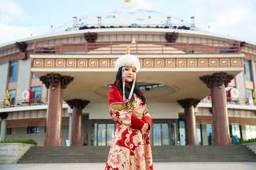 Mongolian girl wearing traditional costume of the Mongolian Ordos tribe