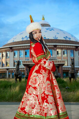 Obraz premium Mongolian girl wearing traditional costume of the Mongolian Ordos tribe