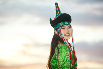Mongolian girl wearing gorgeous traditional costumes of Mongolian tribe