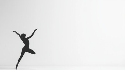 Silhouette of a dancer in graceful motion.