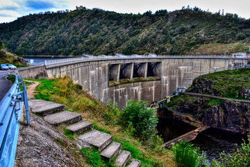Chambles, France - October 5th 2024 : View of the EDF hydraulic dam of Grangent. This place is an hydroelectric power station.