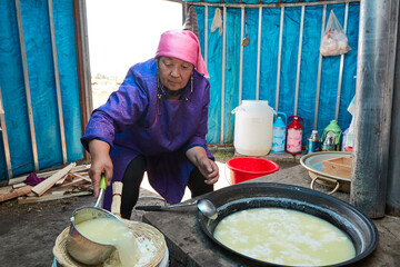 The process of making milk tofu using traditional techniques in a yurt