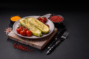 Delicious zucchini cut into two halves baked with salt, spices and herbs