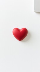 Obraz premium A Simple Red Heart, a Symbol of Love and Affection