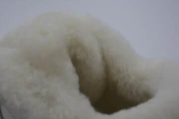 Things, material objects, new, modern shoes located on a white plastic background. Beautiful...