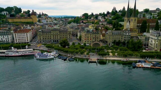 4K Drone Video of the Yachts on Lake Luzern near the Parkhaus National Hotel and Hotel Schweizerhof in Lucerne, Switzerland