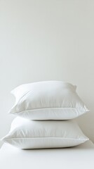 Elegant Stack of Pillows: A Luxurious Bedding Ensemble for a Peaceful Night's Sleep