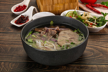 Vietnamese Pho Bo soup with beef and noodles