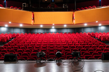 cinema auditorium with red chairs