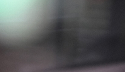 The image is a blurred gradient background. It has a soft, hazy appearance.
