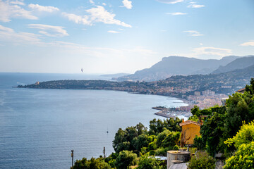 Obraz premium Early morning view on French Riviera, colorful Menton old city and marina on blue Mediterranean Sea near French-Italian border, Monaco, Monte-Carlo, travel destination, panoramic view