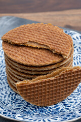 Traditional Dutch sweet dessert, Butter caramel syrup waffles, fresh baked