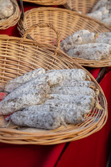 Variety of homemade dried salami sausages in French butchery shop, Dordogne, France, meat food...