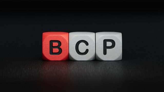 wooden cube with bcp text. Financial, marketing.close up of wooden elements,Business Concept.3D rendering on black background.