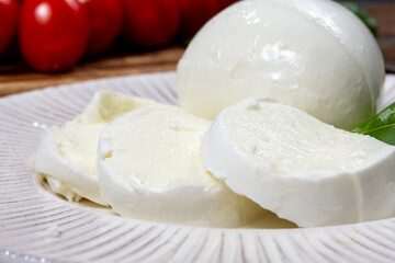 Tasty italian food, fresh white buffalo mozzarella soft cheese balls from Campania close up