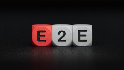 text E2E is written on wooden cubes standing in a row. around the blocks with letters. can be used for business and financial concepts. selective focus.3D rendering on black background.