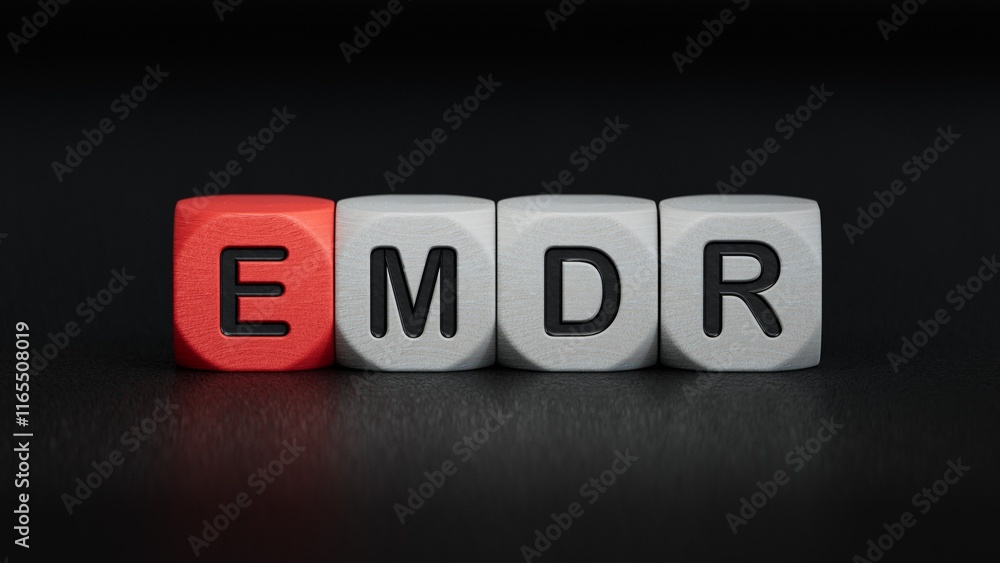 Poster the text emdr word eye movement desensitization is written on notepad . medical concept.close up of 