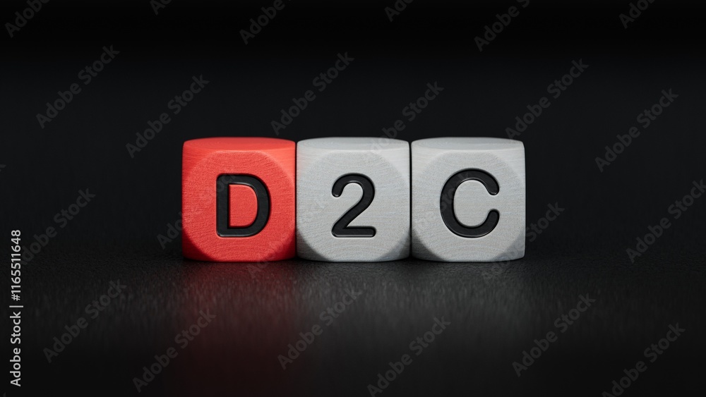 Poster three stone cubes, tables with the word d2c - acronim direct to consumer.close up of wooden elements