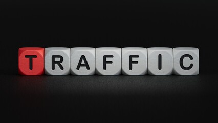 Wood block cube shape put the front computer keyboard with word TRAFFIC.close up of wooden elements,Business Concept.3D rendering on black background.