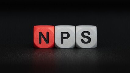 Wooden cube block with text the nps.close up of wooden elements,Business Concept.3D rendering on black background.