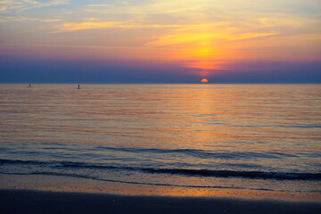 sunset on the beach in the netherlands