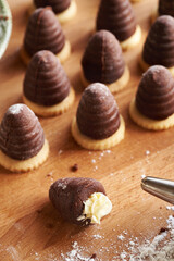 Fillling homemade beehives or wasp nests, Czech no-bake Christmas cookies, with eggnog cream