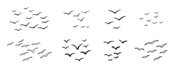 Birds flying line in the sky set. Ink grunge flock of birds afar brush hand drawn. markers and crayons