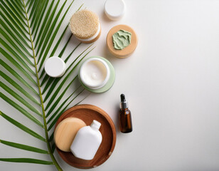 Fototapeta premium Top view of skincare concept with copy space in the white background studio shot 